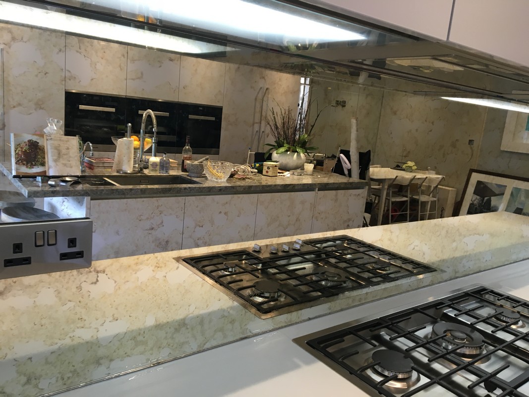 Mirror glass splashback in South Lambeth luxury kitchen